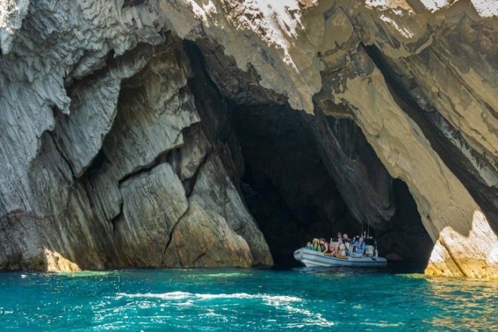 a close up of a large rock in a pool of water